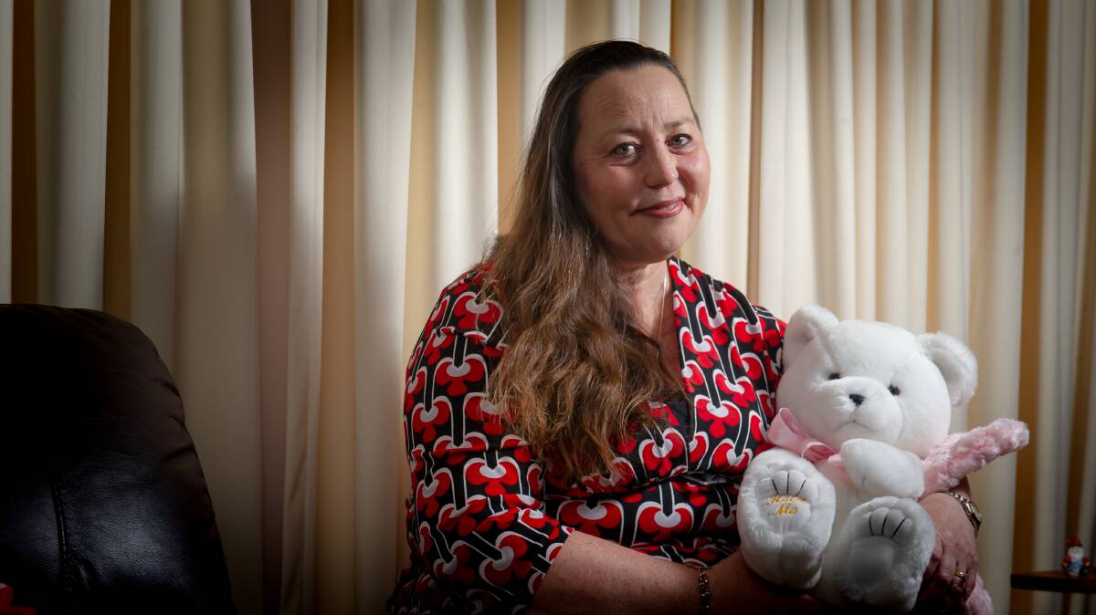 Donna Campbell, pictured with the ashes of her daughter Larissa, who was stillborn in 2006. Picture: Elesa Kurtz
