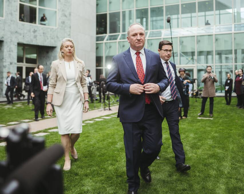 Nationals leader Barnaby Joyce flanked by supporters Bridget McKenzie and David Littleproud on Monday. Picture: Dion Georgopoulos