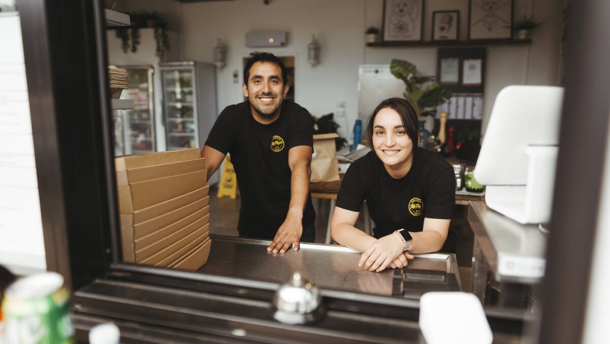 Owner of Mr.Papa in Fyshwick Carlos Ramirez, and supervisor Carolina Echevarria, say their business doesn't rely on single-use plastics. Picture: Dion Georgopoulos