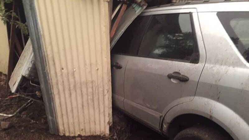 Steve Rendall's car, which was pushed into his garage door by the water. Picture: Steve Rendall