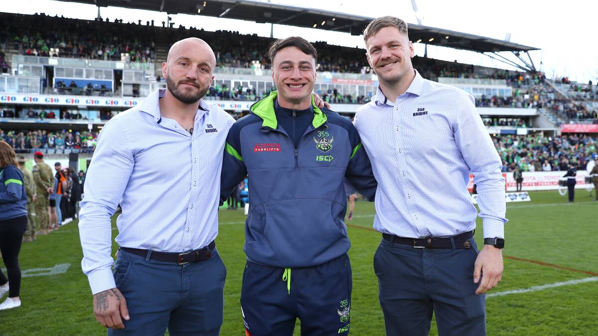 Charnze Nicoll-Klokstad, centre, became emotional after playing what could have been his last game for the Raiders. The club honoured him and fellow departing players Josh Hodgson and Ryan Sutton on the weekend. Picture by Raiders Media