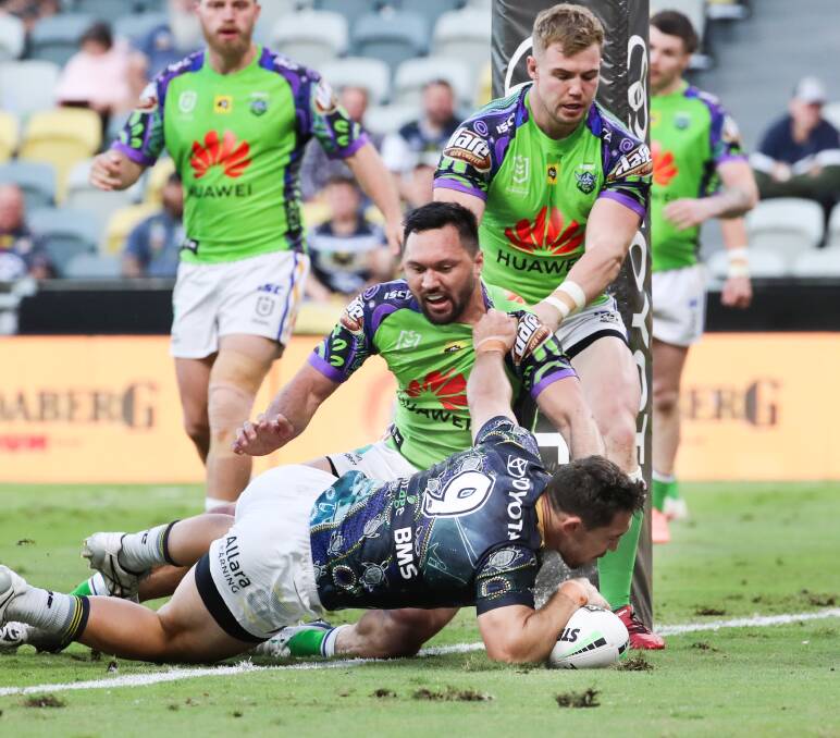 Cowboys hooker Reece Robson darts over for a soft try. Picture: NRL Imagery