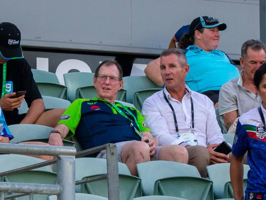 Mulholland discusses the state of affairs with Raiders chief executive Don Furner at the Perth Nines. Picture: Raiders Media