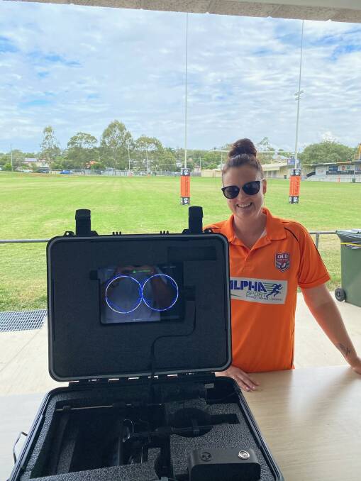 Carina trainer Rebecca Brown, from Rugby League Brisbane, with the Eye Guide. Picture: Supplied