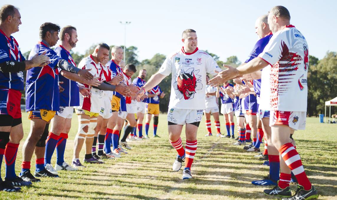 Craig Glover received a guard of honour for his milestone game. Picture: Dion Georgopoulos