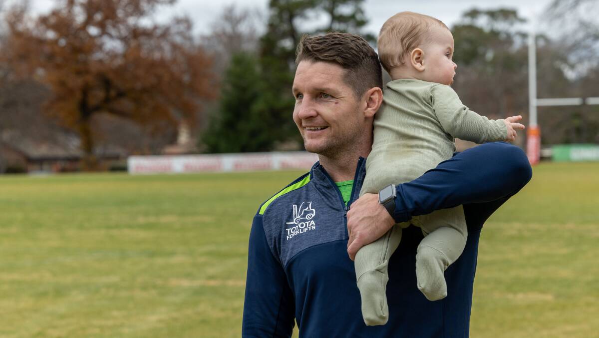 Croker gets some extra gym work in with son Tate. Picture by Gary Ramage