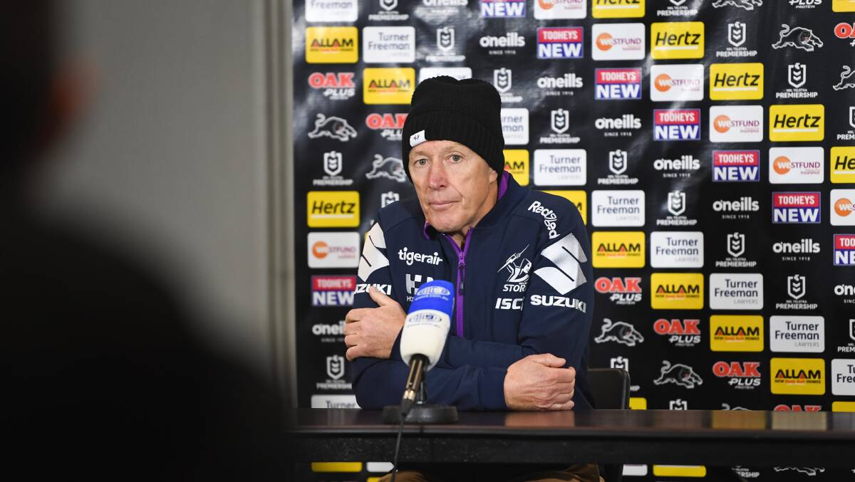 Storm coach Craig Bellamy rugs up ahead of a potential nudie run. Picture: NRL Imagery