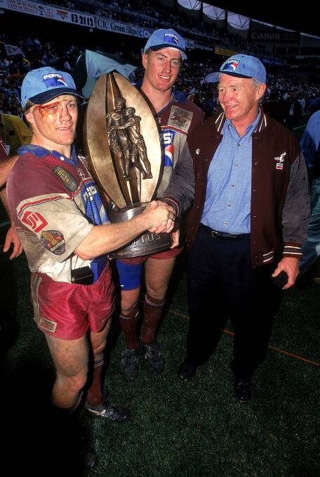 Fulton celebrates Manly's 1996 grand final win with Geoff Toovey and Steve Menzies. Picture: Getty Images