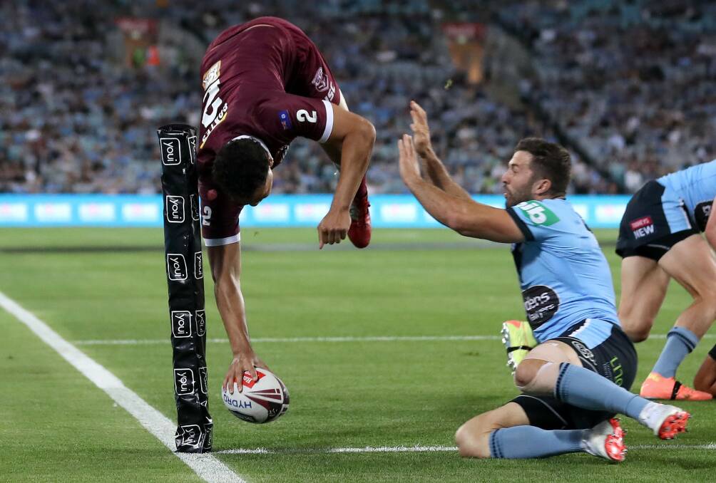 Queensland's Xavier Coates opened the scoring with this great try. Picture: Getty Images