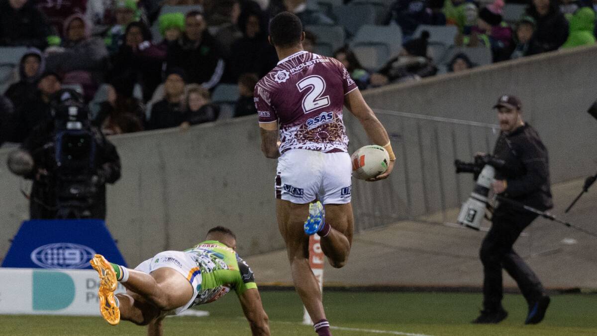 Jason Saab sprints clear - just as Manly ran away with the game to end the Raiders' five-game winning streak. Picture by Gary Ramage