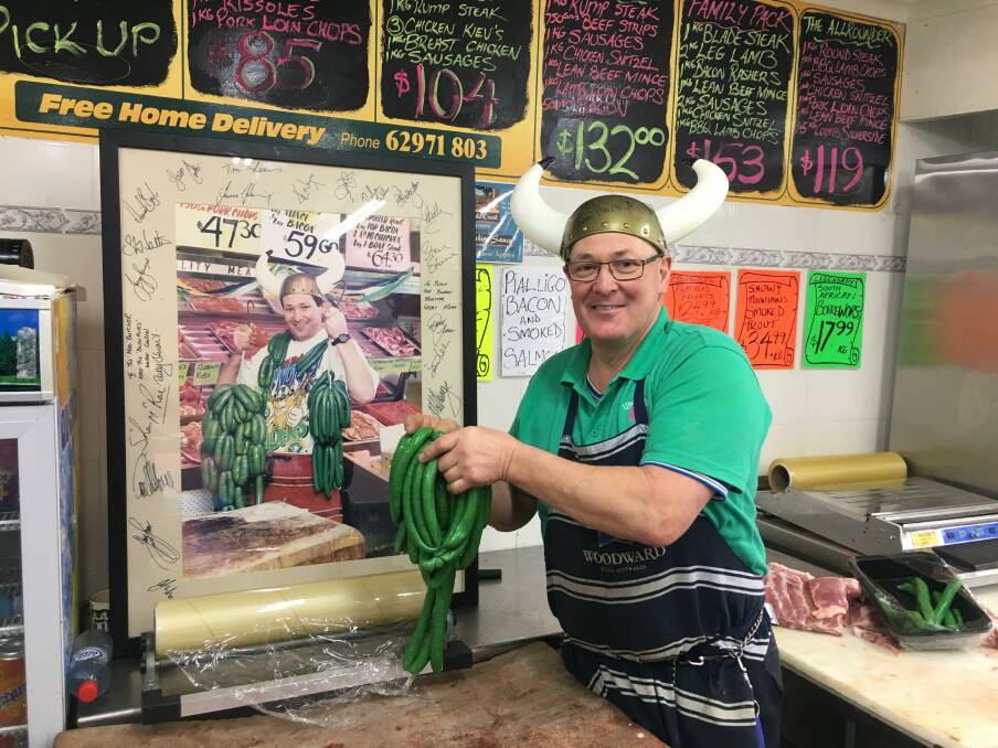 Green fever is sweeping Canberra with tickets flying out the door. Just like Peter "Butcher" Lindbeck's famous green sausages. Picture: Peter Brewer