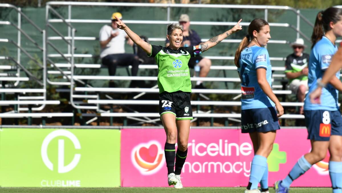 Canberra striker Michelle Heyman celebrates her opening goal. Picture by Elesa Kurtz