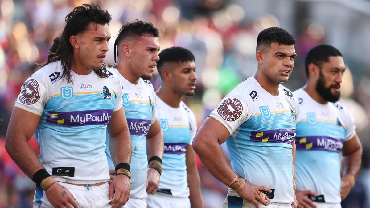 Titans star David Fifita, right, is mulling over whether to enact a contract clause that would allow him to leave the Gold Coast. Picture Getty Images