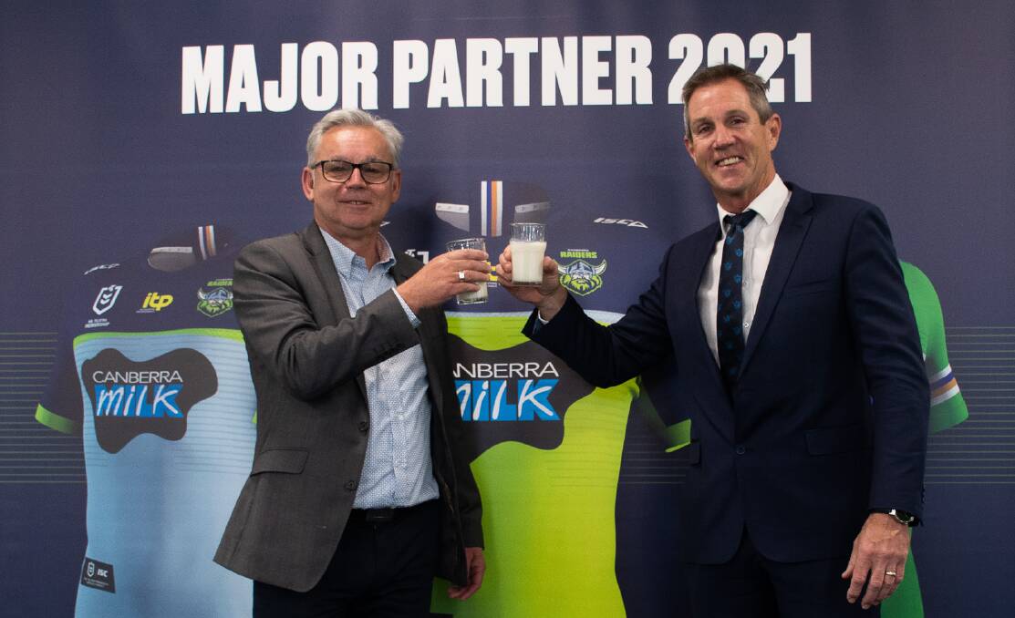 Capitol Chilled Foods Australia managing director Steve Ness and Raiders boss Don Furner toast the new deal. Picture: Raiders Media