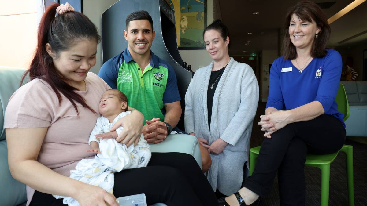 Raiders halfback Jamal Fogarty with Mu Dah and her son Raphael, Nicarla Waugh and Ronald McDonald House operations manager Toni Lea-Howie. Picture by James Croucher