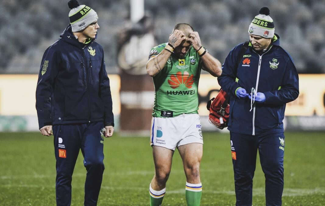 Raiders co-captain Josh Hodgson limps off with what appears to be a season-ending knee injury. Picture: Dion Georgopoulos