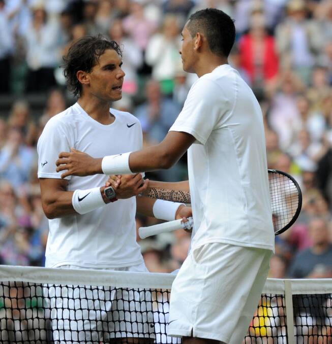 Kyrgios beats Rafael Nadal at Wimbeldon in 2014. Picture: Getty Images