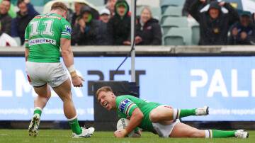 Raiders prop Ryan Sutton celebrates his first try of the season - scored off a charge down of a Ben Hunt bomb. Picture: Getty Images