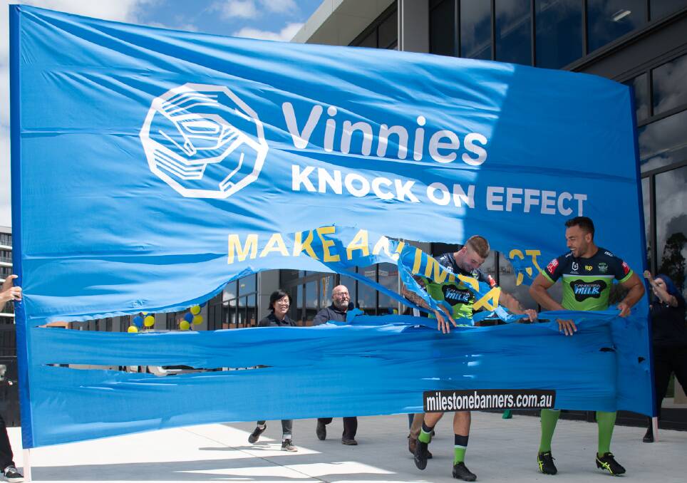 Raiders Sia Soliola, Curtis Scott and Ryan James helped Vinnies launch their Knock On Effect campaign. Picture: Raiders Media