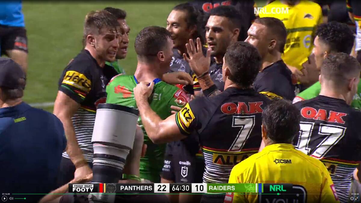 Raiders star Jack Wighton comes in and breaks up the melee. Picture: Screengrab of nrl.com