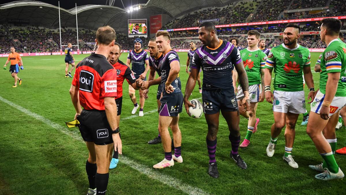 Storm players remonstrate with officials in last year's preliminary final loss to the Raiders. Picture: NRL Imagery
