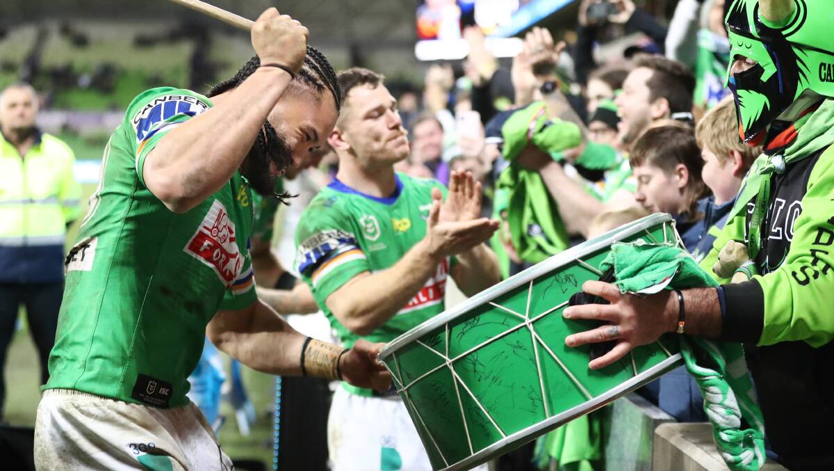 Raiders second-rower Corey Harawira-Naera takes part in what's becoming the traditional banging of the drum following a win in Melbourne. Picture: Getty Images