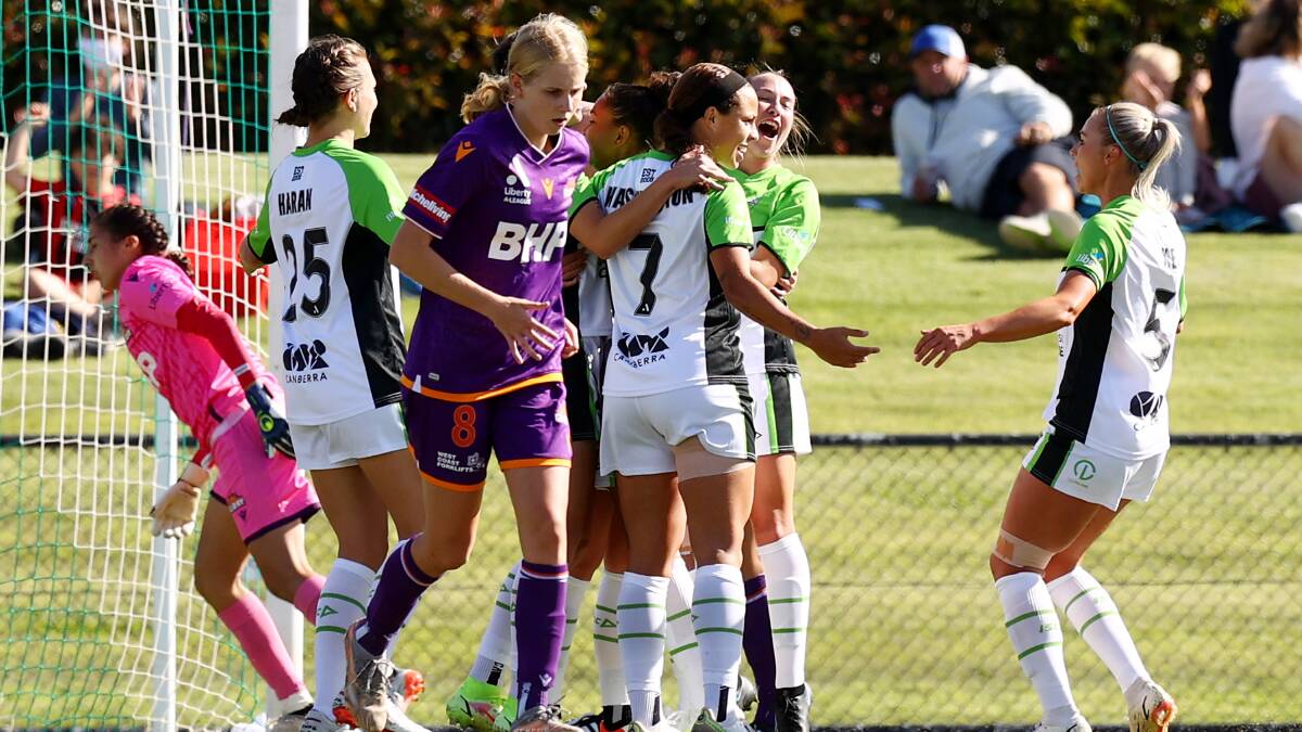 Grace Maher celebrates her penalty that opened the scoring for Canberra. Picture: Getty Images