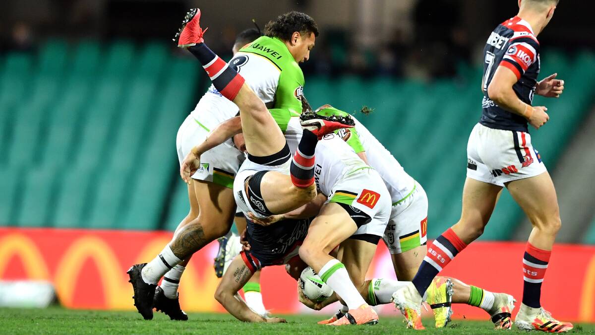 Raiders five-eighth Jack Wighton was put on report for this tackle on Roosters winger Brett Morris. Picture: NRL Imagery