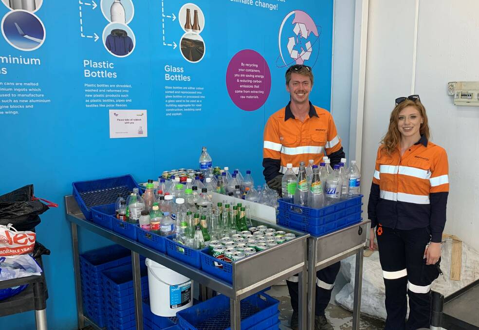 Recycling champions: Evoenergy's Ayla Sorensen and Tom Atkins at the Fyshwick:CDS recycling depot.