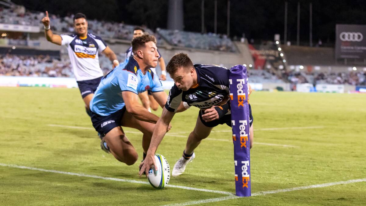 Brumbies winger Mack Hansen scored a hat trick in his man of the match performance. Picture: Sitthixay Ditthavong