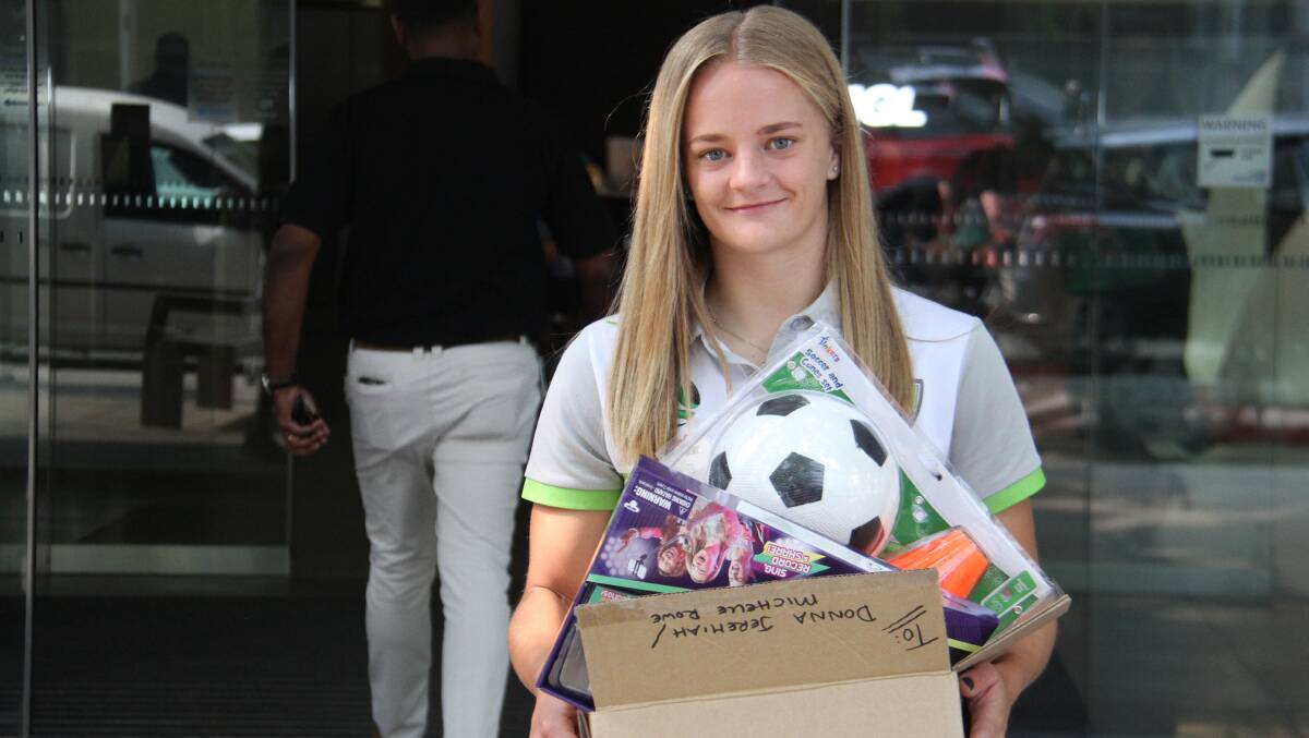 Canberra United forward Hayley Taylor-Young at the toy drive reveal. Picture: Capital Football
