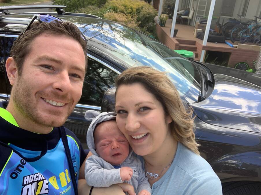 Dan and Scarlett Conroy with their newborn Johnathon, who was delivered in a hospital car park. Picture: Supplied