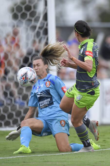 Leena Khamis, wearing the captain's armband, couldn't get past Brisbane Roar keeper Mackenzie Arnold. Picture: Getty