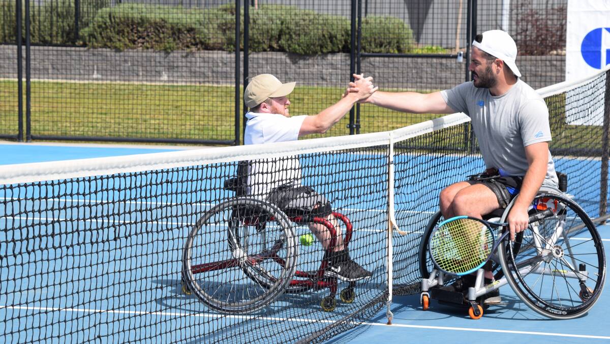 Matthew Leggett and Martyn Dunn shake hands after the singles finals at the Canberra Open. Picture: Tennis ACT