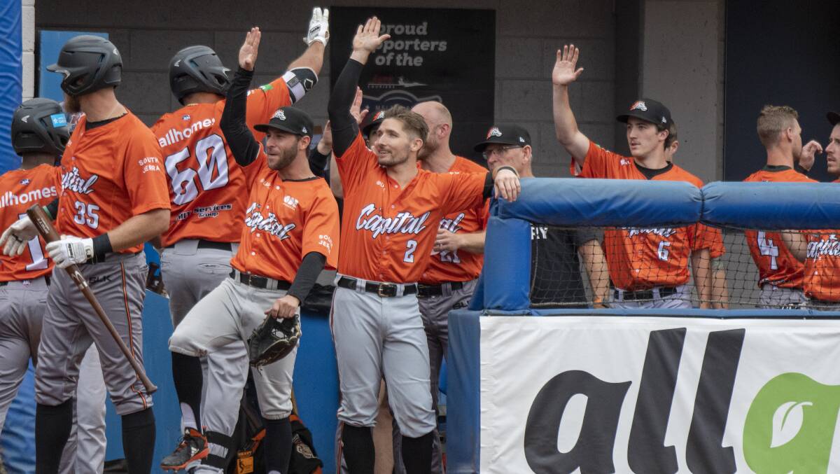 The Cavalry celebrate after Donald Lutz hits a homer. Picture: SMP Images