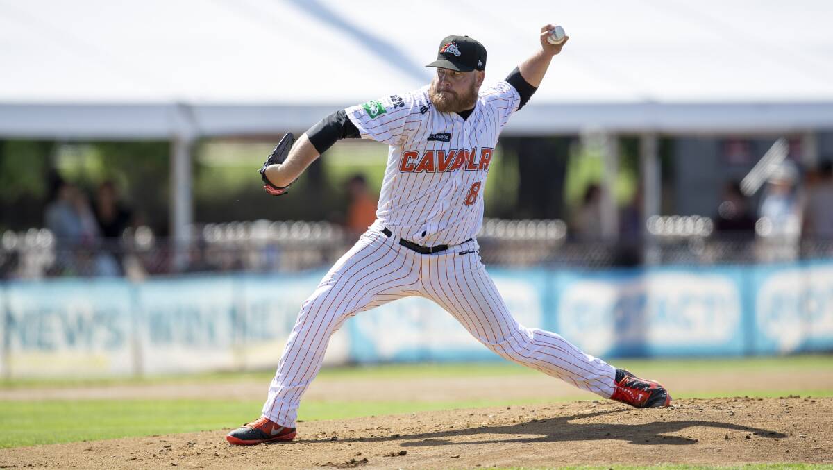 Cavalry pitcher Frank Gailey throws a strike against the Melbourne Aces. Picture: Keegan Carroll