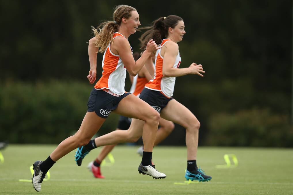Giants' Tarni Evans and Emily Pease are loving their first AFLW pre-season. Picture: Getty Images