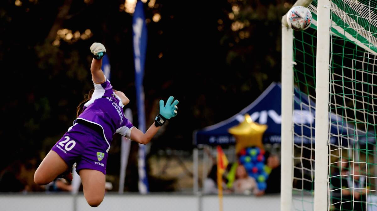 Canberra United goalkeeper Sham Khamis made five saves in their loss to Brisbane Roar but couldn't stop this effort. Picture: Getty Images