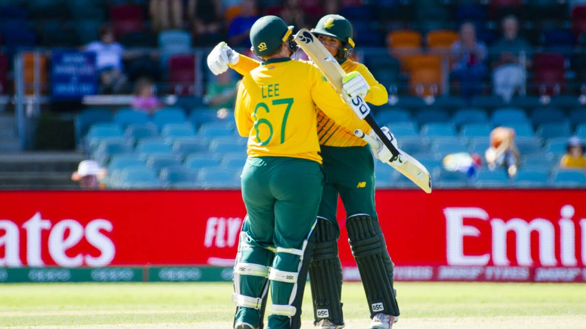 South Africa's Lizelle Lee and Sune Luus celebrate Lee's century. Picture: Jamila Toderas