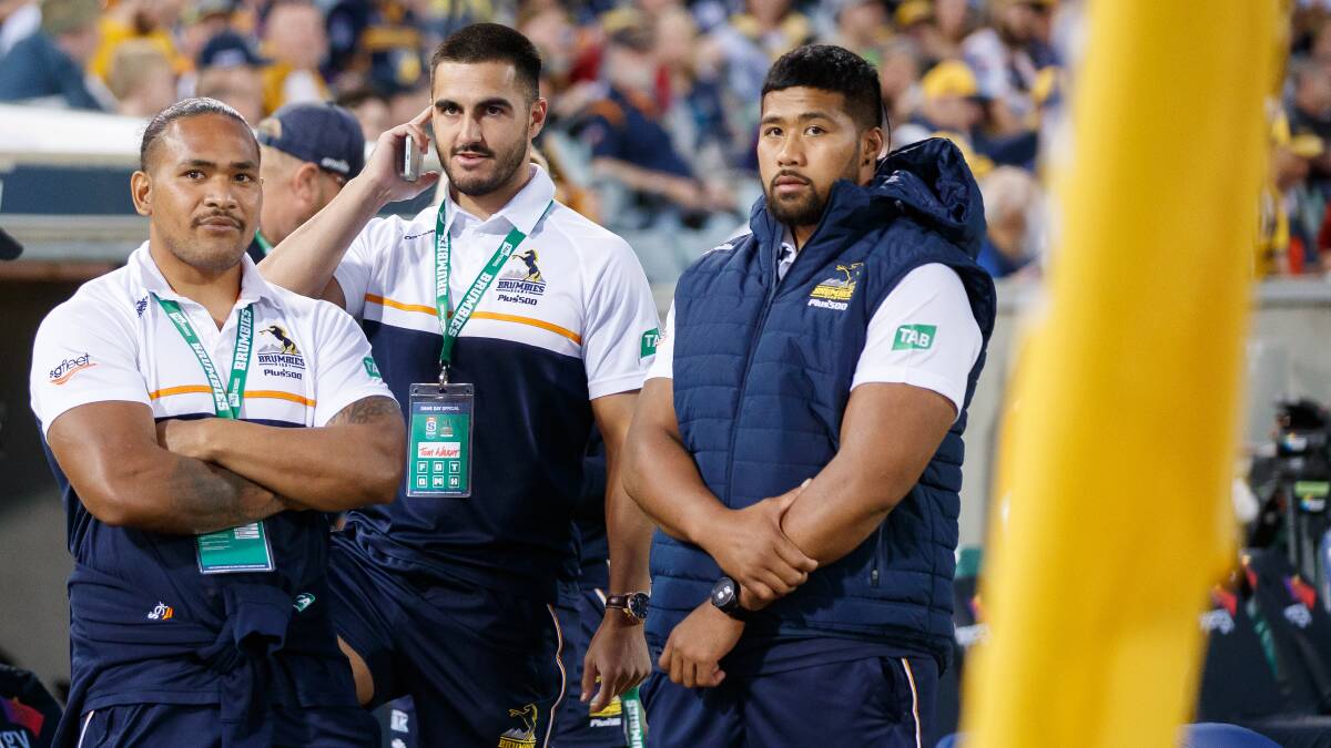 Injured Solomone Kata, Tom Wright, and Folau Fainga'a watched the Brumbies win from the sideline. Picture: Sitthixay Ditthavong