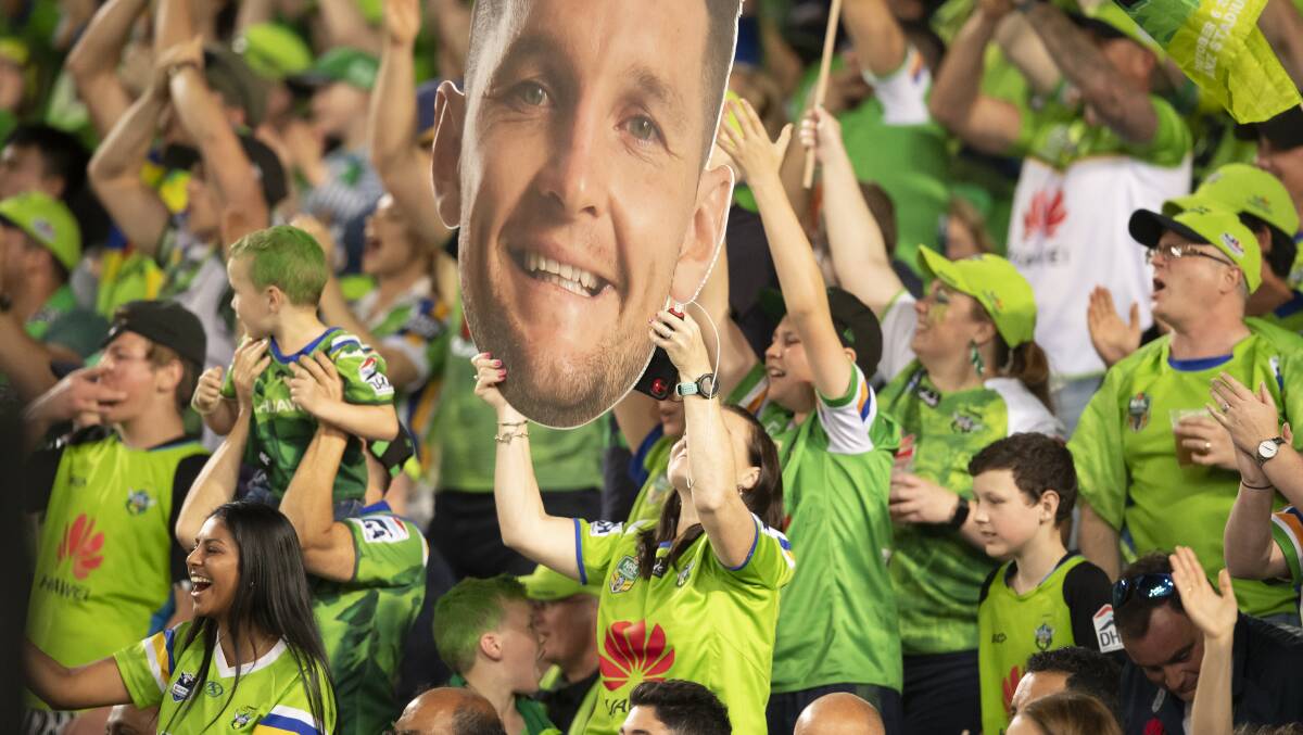 Fans cheering the Canberra Raiders during the NRL grand final. Picture: Sitthixay Ditthavong