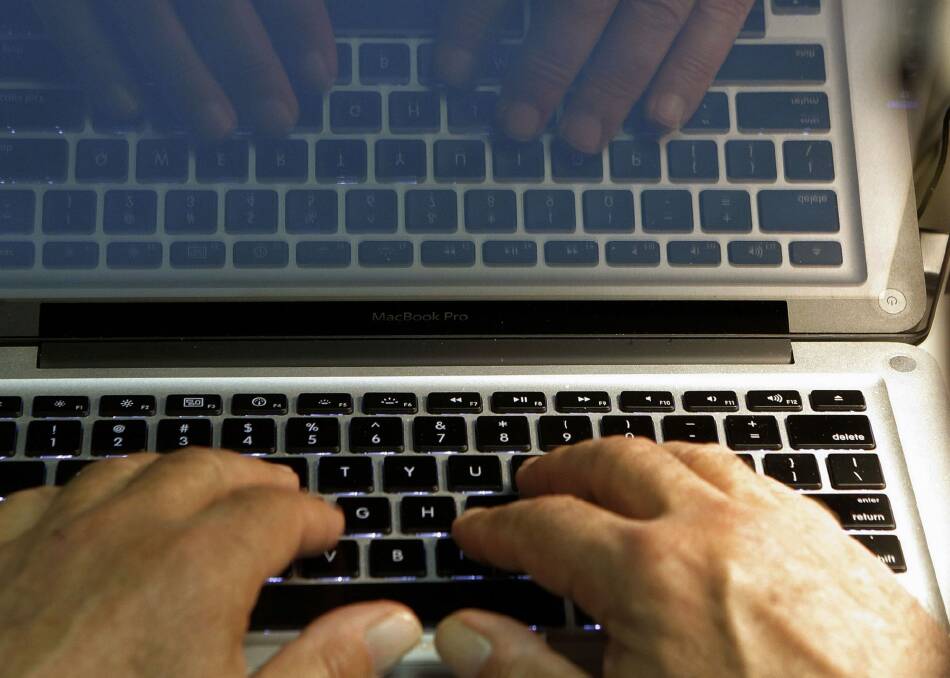 A man will face court after allegedly luring men to a Port Melbourne property using a false online profile. Photo: AP