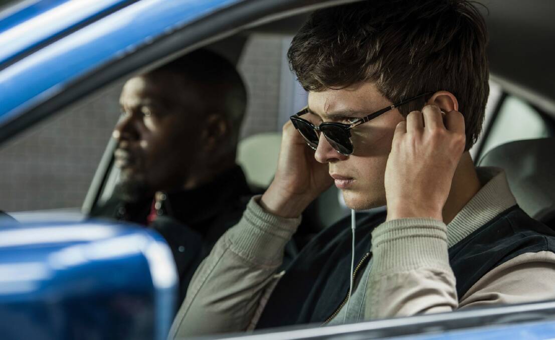 Ansel Elgort, right, and Jamie Foxx in a scene from Baby Driver. Photo: Wilson Webb
