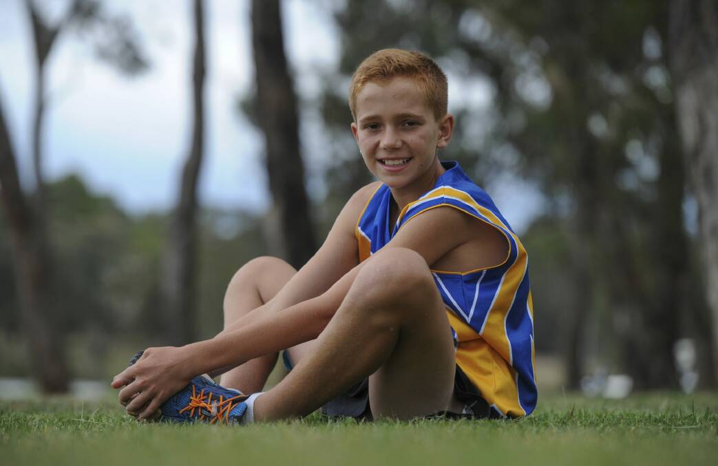 Elijah plans to run in the Australian Running Festival. Photo: Graham Tidy
