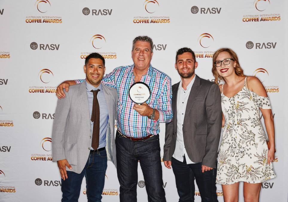 Hugh Souyave, Peter Bragg, Daniel Moscaritolo and Joanna Michajlow from Bean!Roasters by Cosmorex accepting their 2017 Champion Australian Roaster trophy at the Australian International Coffee Awards. Photo: Craig_MOODIE