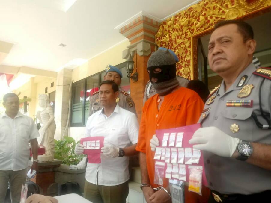 Johnsson being paraded in an orange jumpsuit by Indonesian police on Thursday at a press conference. Photo: Supplied