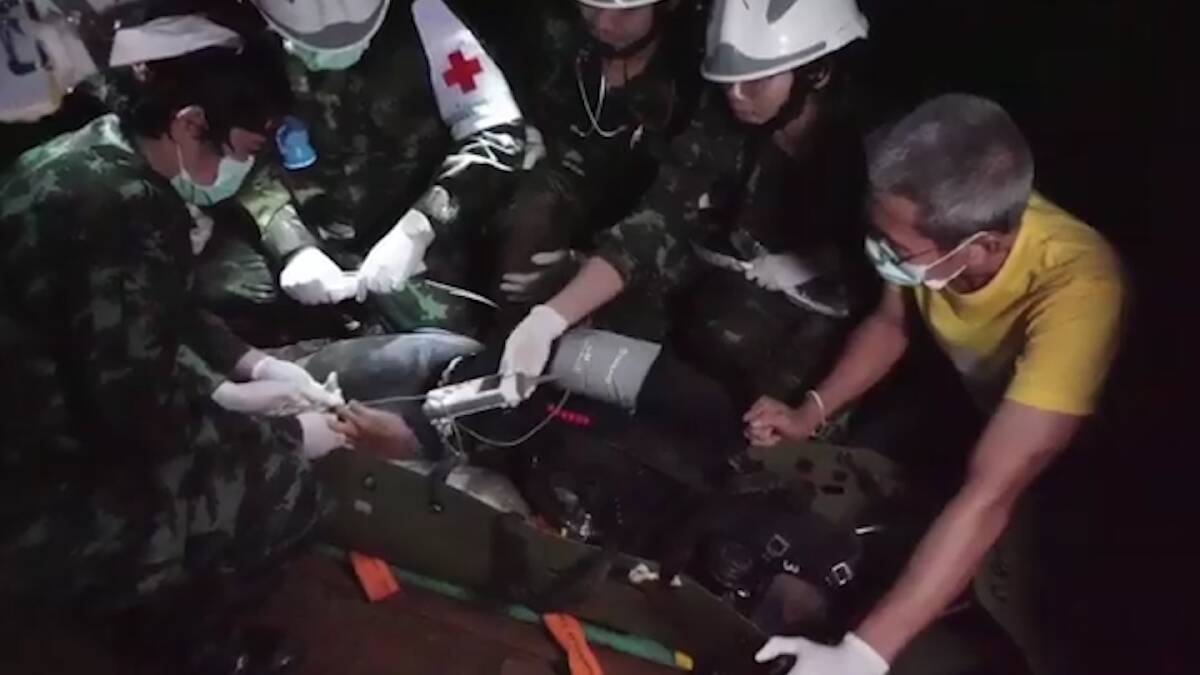 The Tham Luang rescue is captured in a still from a video recorded by Thai Navy SEALs. Photo: Thai Navy Seal Facebook