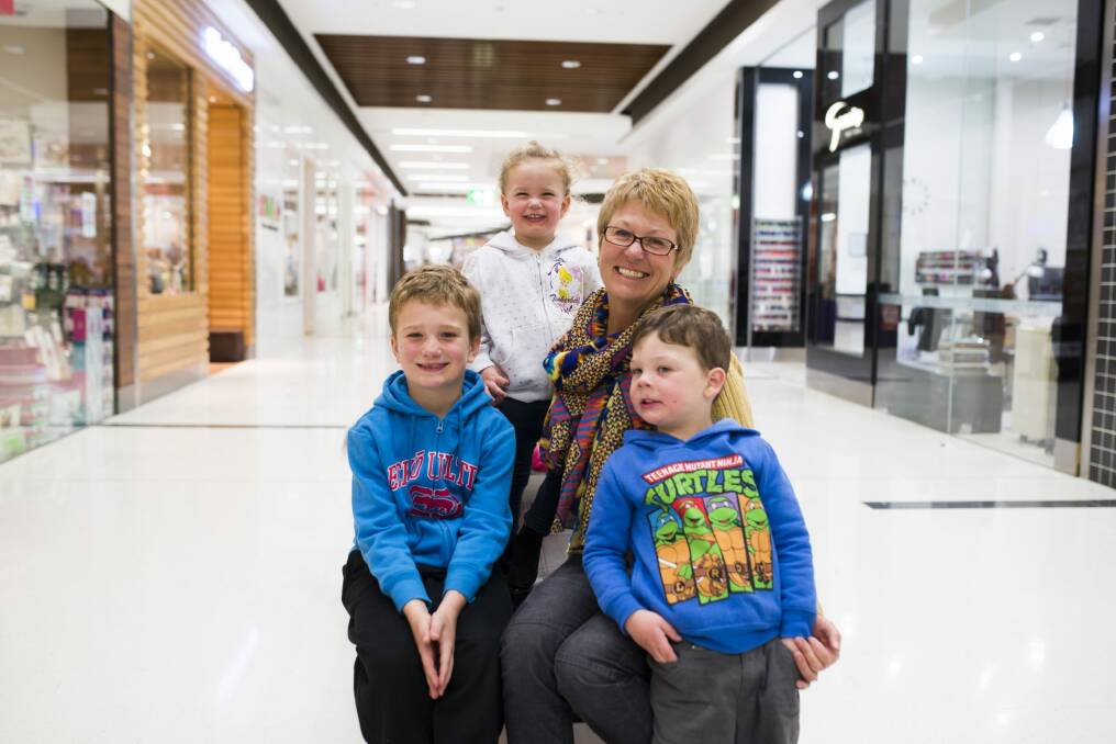 Labor voter Lexi Webster, of Ainslie, with grandchildren Taj (7), Sienna (2) and Jax (4) Flahive at the Majura Shopping centre.  Photo: Rohan Thomson