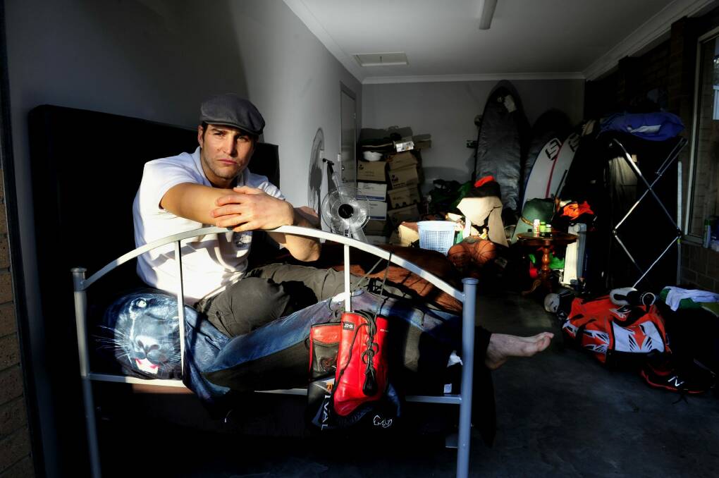 Lovett has been living in his boss's garage to save money. Photo: Melissa Adams