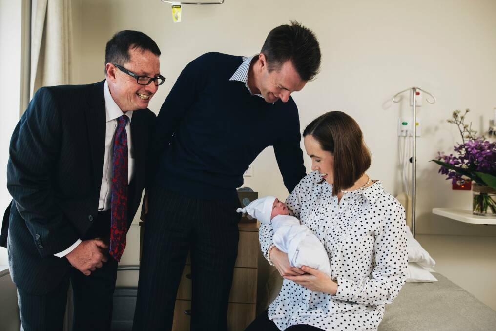 Pregnant Pause advocator Professor Steve Robson with new parents Andrew and Karina with their son Nicholas at John James Hospital. Photo: Rohan Thomson